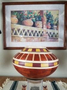 The wood dust from these South American hardwoods in this vase can cause COPD, or even cancer. 