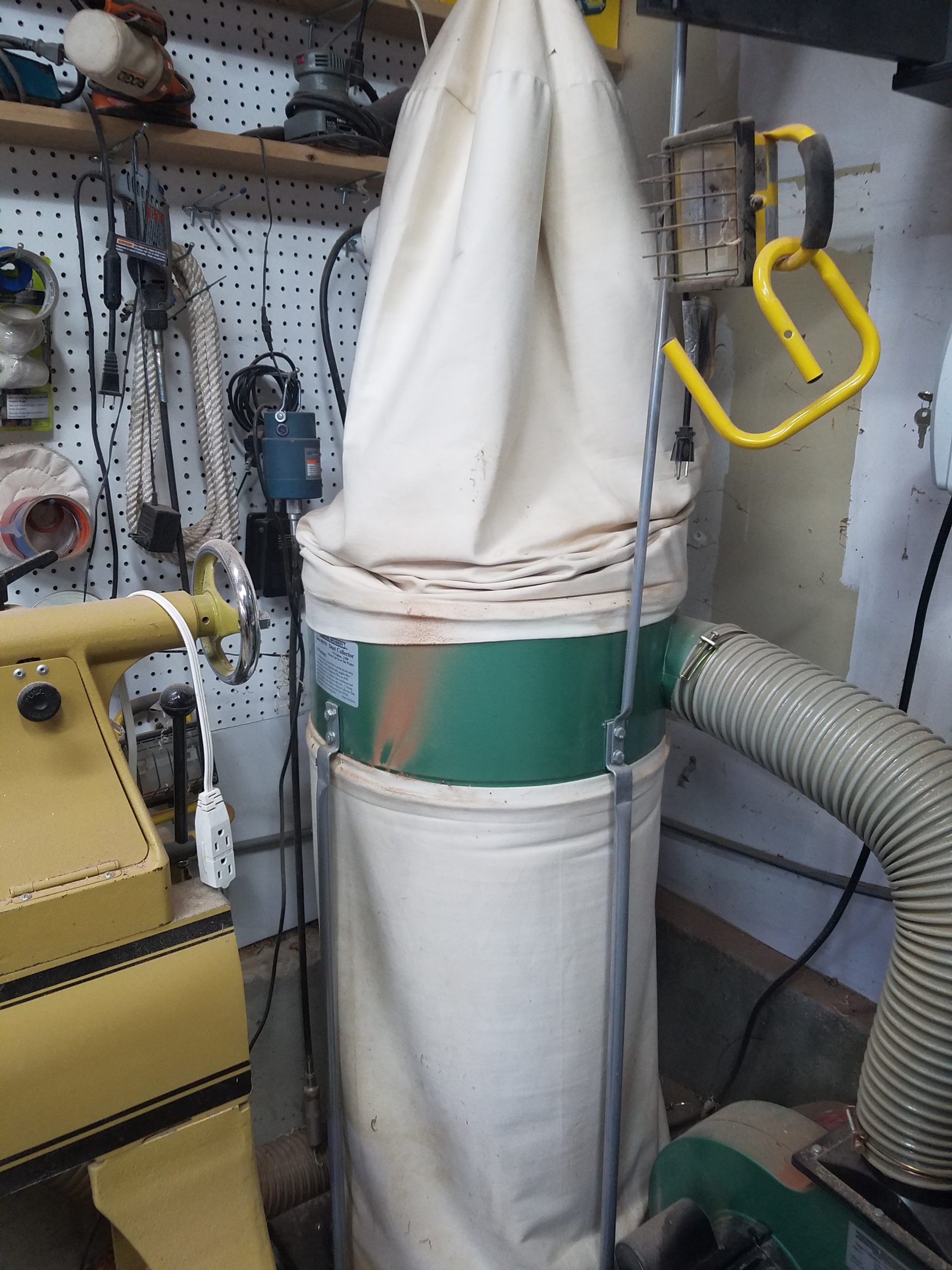 My dust collector before I change out the cloth dust filter and dust bag.
