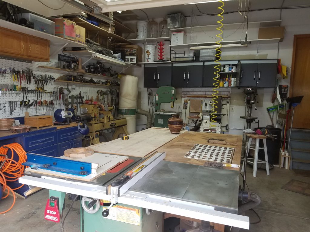 picture of woodshop in the single car side of the garage.