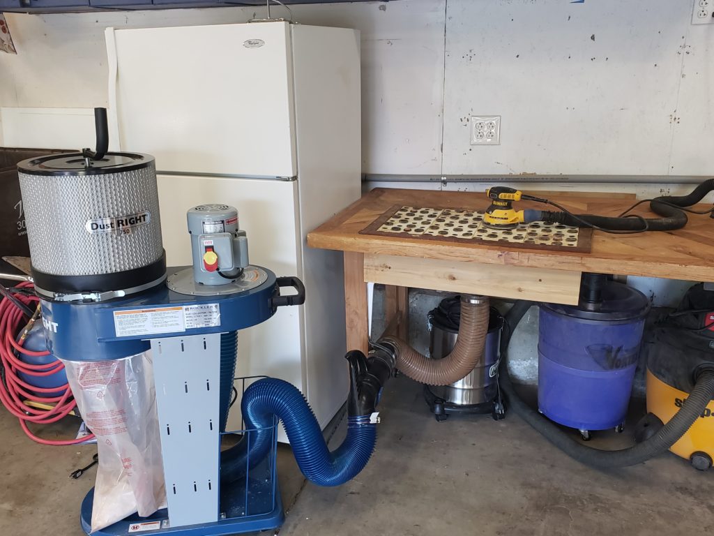Sanding table prevents wood dust from escaping into the air. 